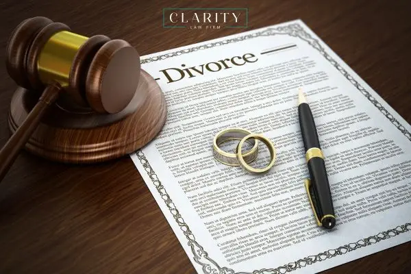 divorce forms and a gavel on a desk