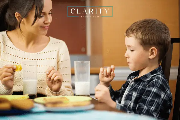 Mother eating with her child