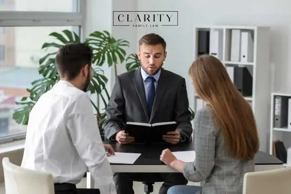 a couple meeting with a lawyer for an uncontested divorce