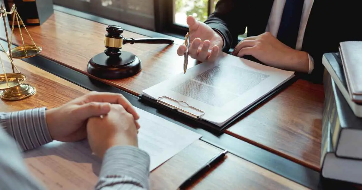 Attorney and client going over financial discovery