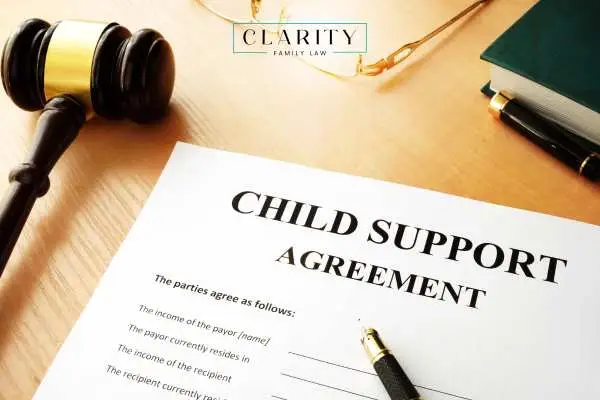 a child support court form and gavel on a judge's desk