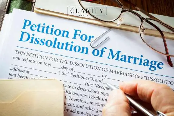 a person filling out a petition for divorce