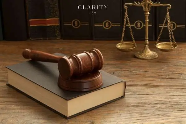 Gavel beside scale