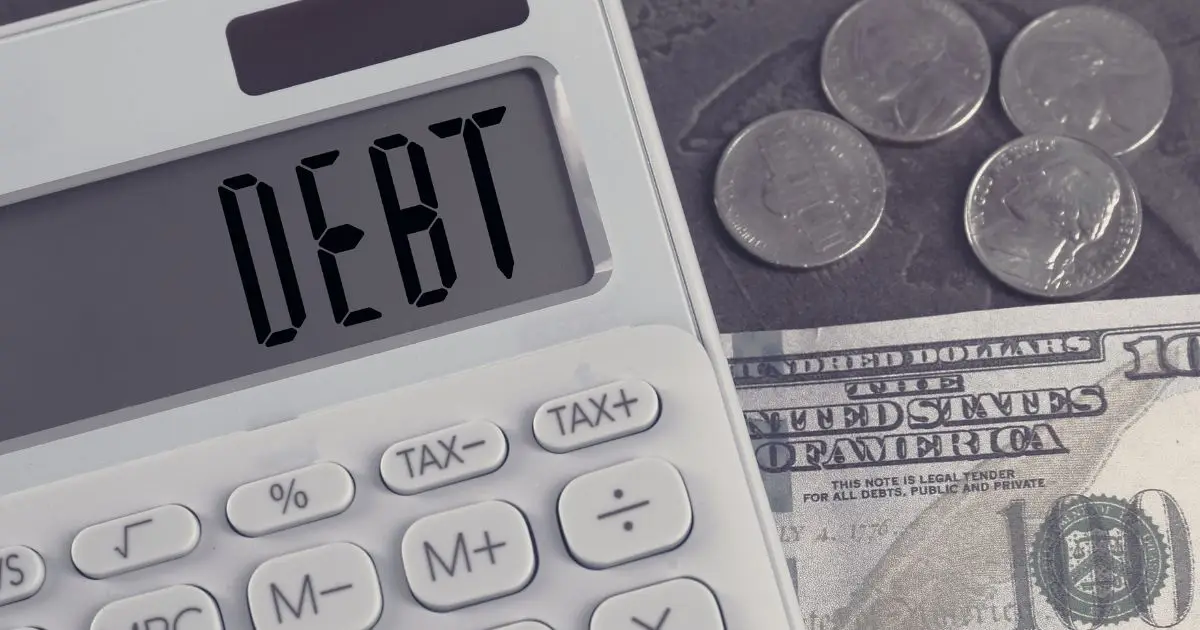calculator showing debt with cash underneath