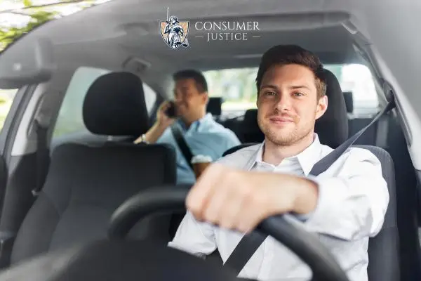 a Lyft driver in his vehicle with a passenger