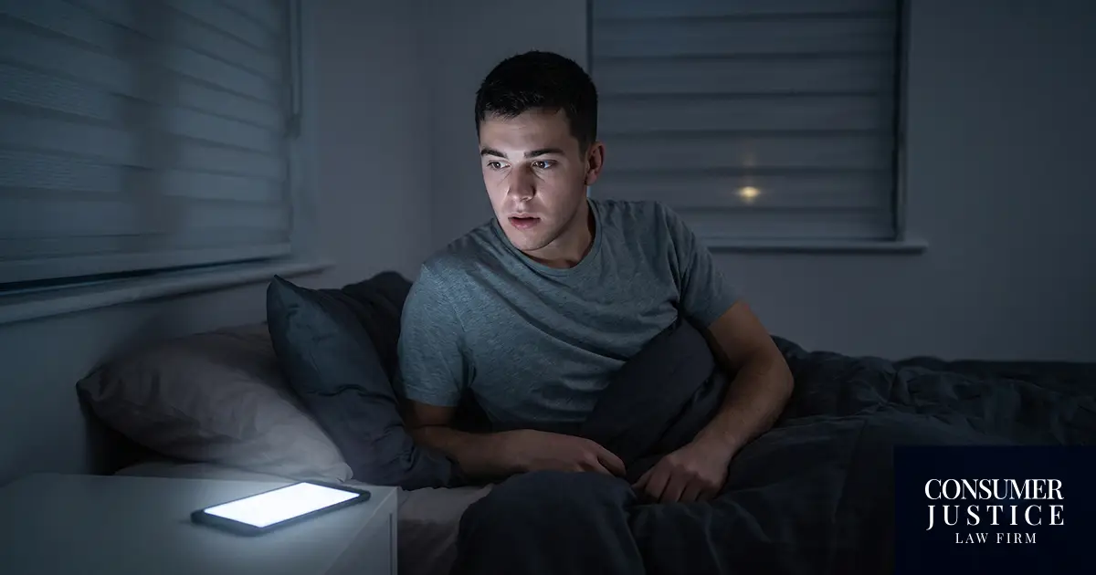 A man gets a late night call from a debt collector.