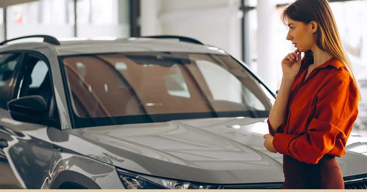 A woman wonders if credit report errors will raise the cost of buying a car.