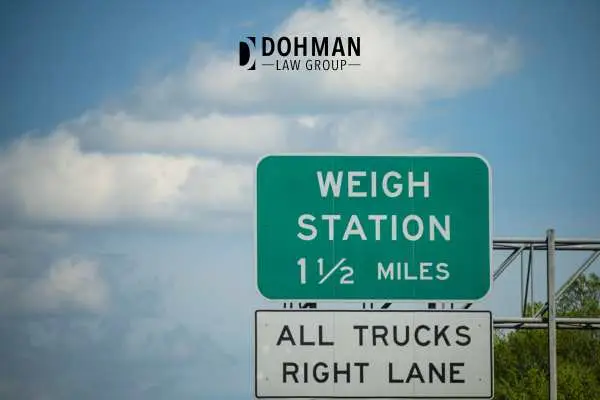 a weigh station road sign for trucks