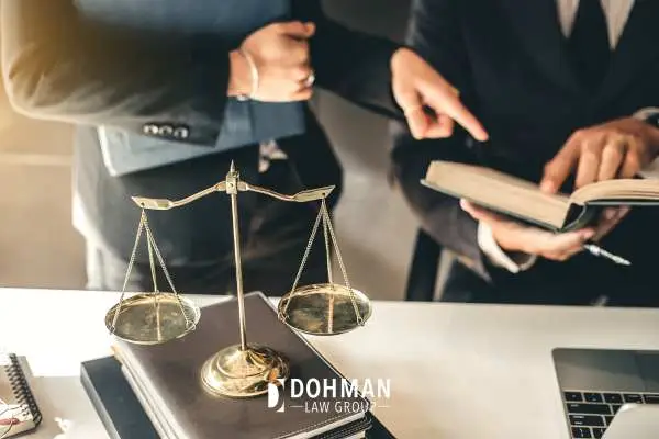 two DUI attorneys looking over a case
