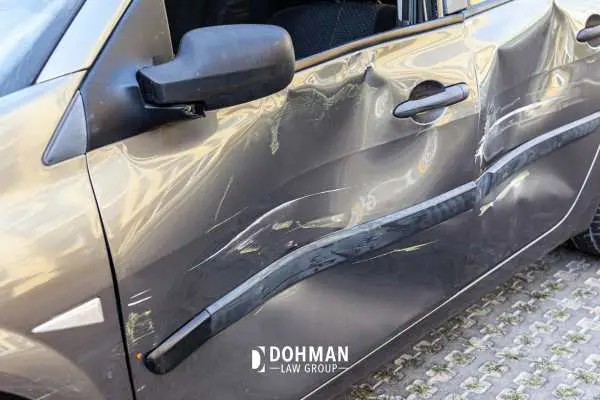 a car with damage to the side after an accident