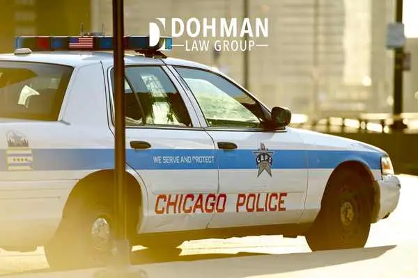 a police car stopped on the side of a road