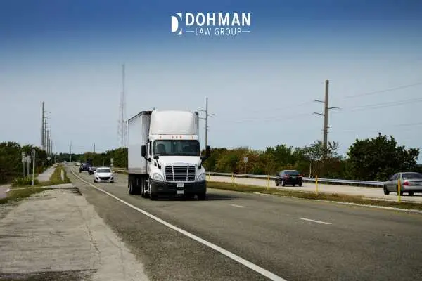 a truck driving down a highway