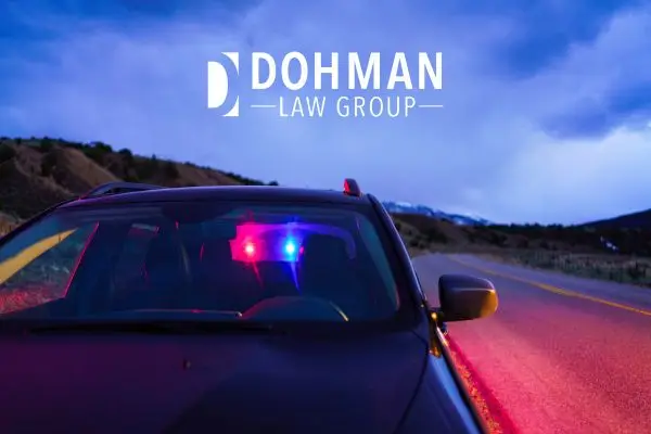a police officer flashing their lights during a traffic stop