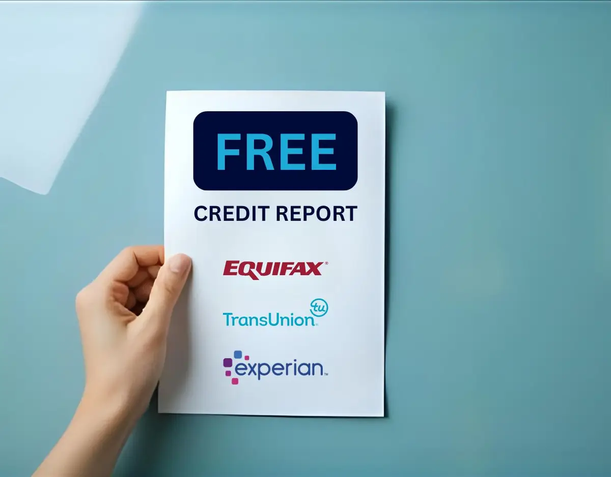 Hand holding a sheet that says Free credit report