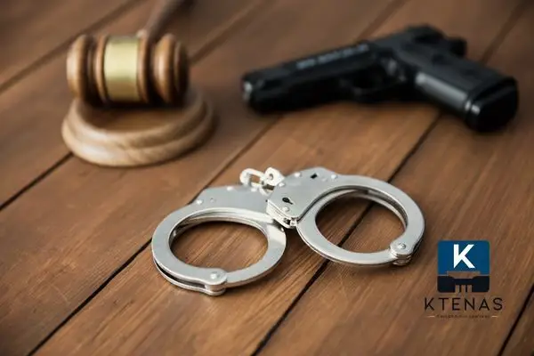 Judges gavel, handcuffs and gun
