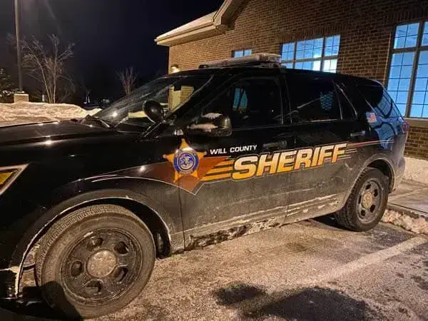 Will County Sheriff vehicle parked in a snow day