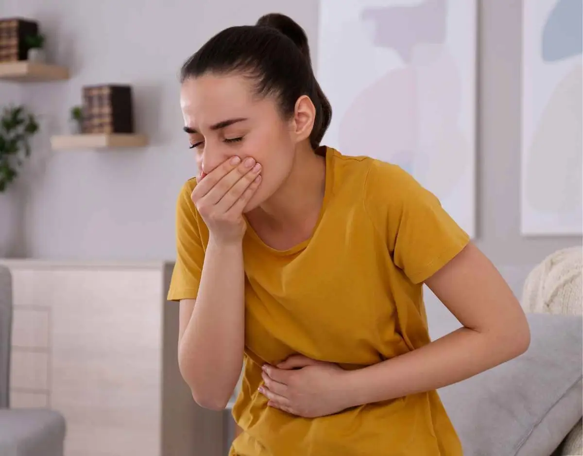 a woman coughing from co2 exposure