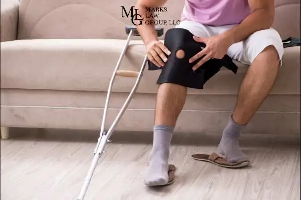 a man putting on a knee brace