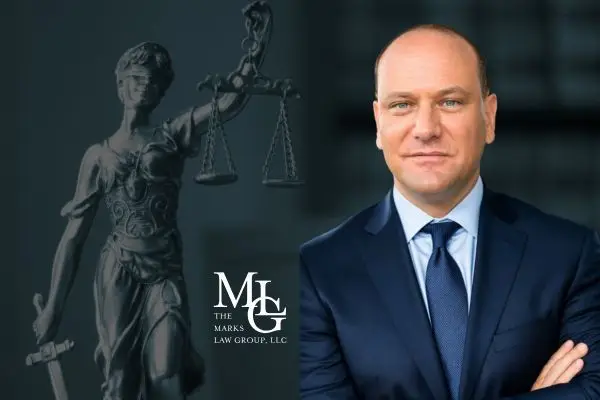 attorney with lady justice in background