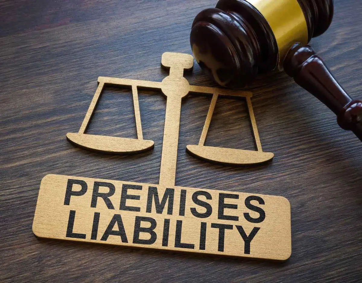 a gavel and premises liability legal documents on a desk