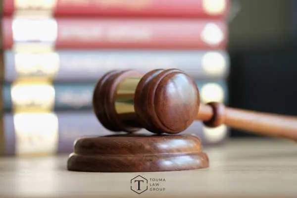 legal books and a gavel on a desk