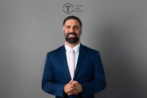 attorney adam touma