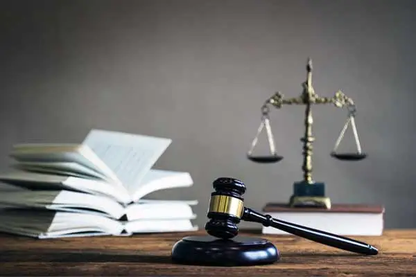 gavel and books on top of a desk