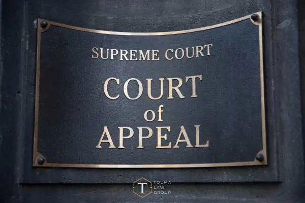 a picture of a plaque on a supreme court building