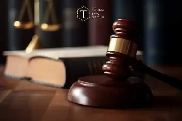a gavel and law books on a table