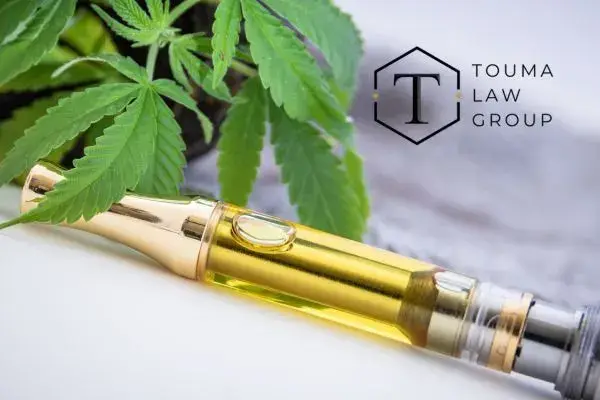 a delta 8 vape pen on a white table