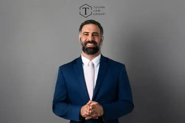 attorney adam touma