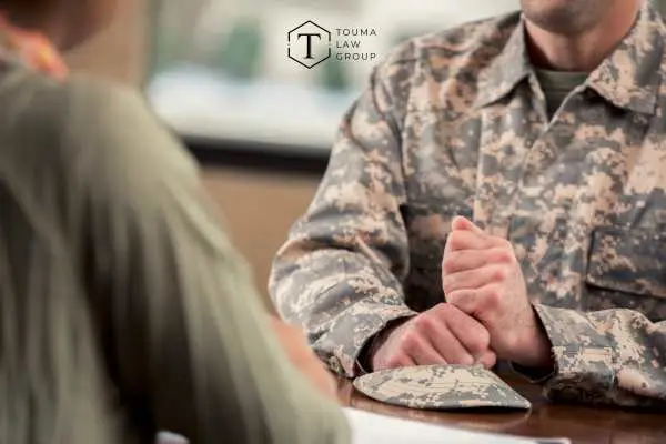 a member of the military meeting with an officer