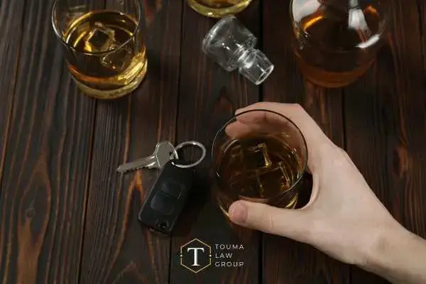 a man drinking at a bar