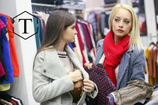 two girls shoplifting in a retail store