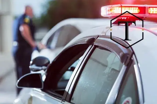 someone receiving a ticket from a police officer