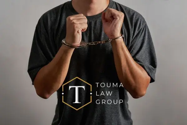 a man in handcuffs after committing a violent crime