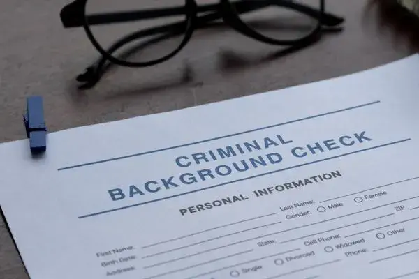 Close-up of a "Criminal Background Check" form