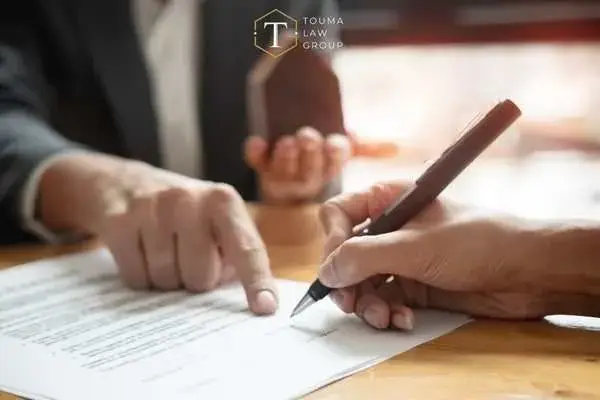 an attorney reviewing a plea deal offer with a client