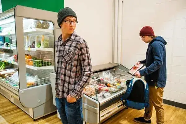 two men shoplifting in a grocery store, penalties for shoplifting